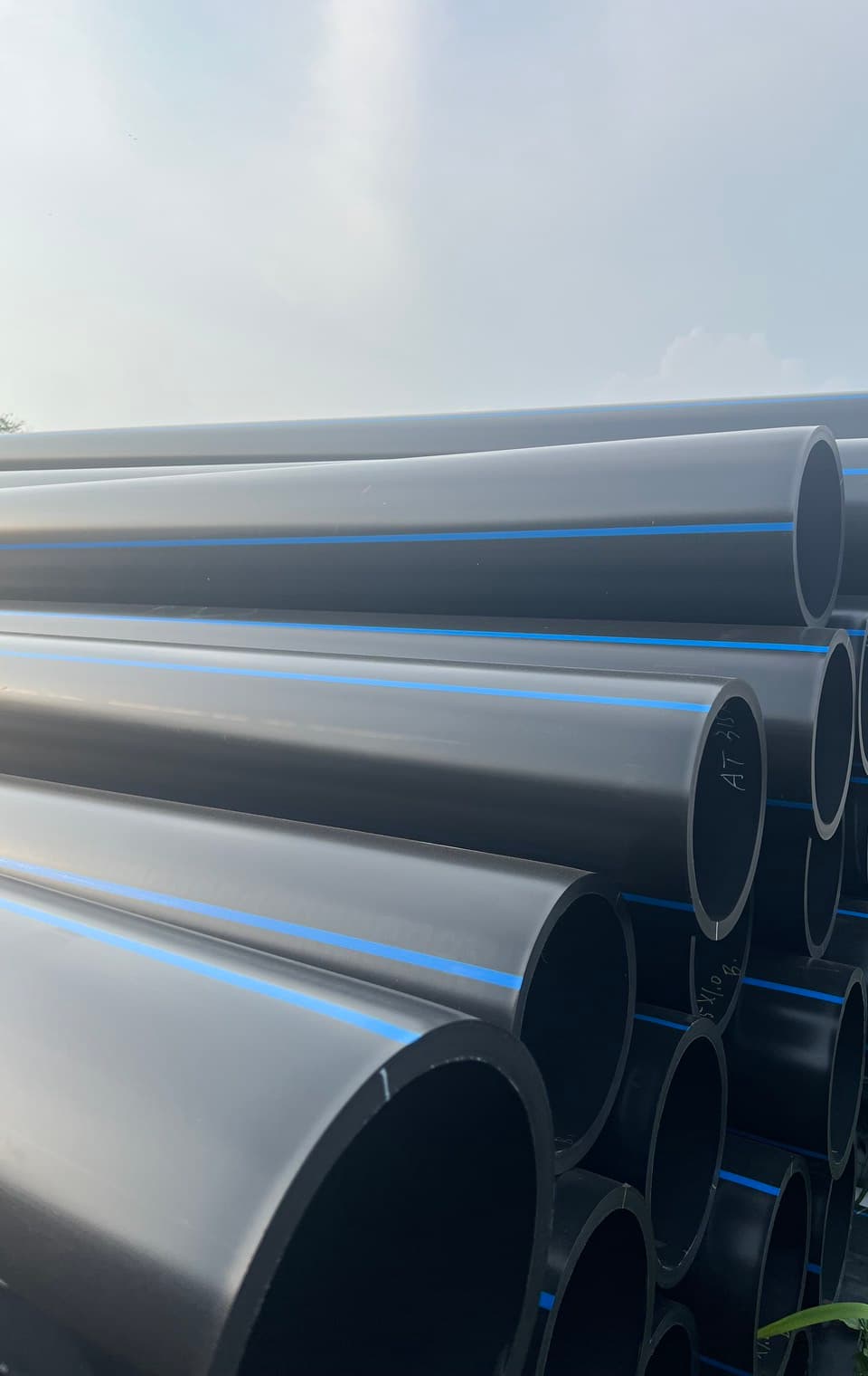 Coiled PE pipe on pallets, the continuous lengths used for ground loops
