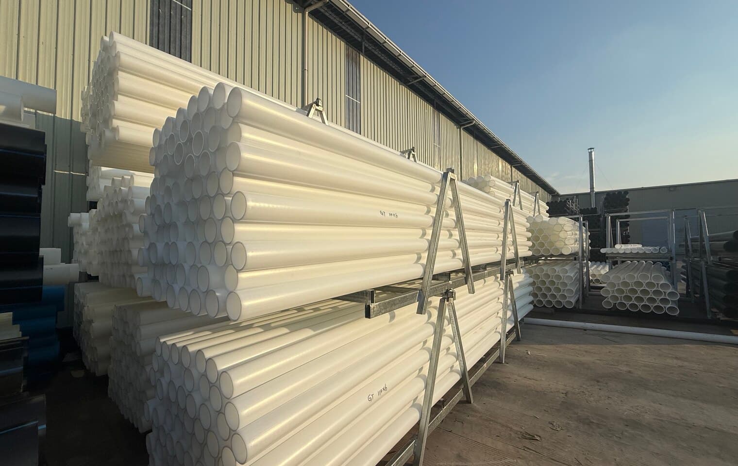 White solid wall pipe bundled in the yard, the plain sizes used inside plants