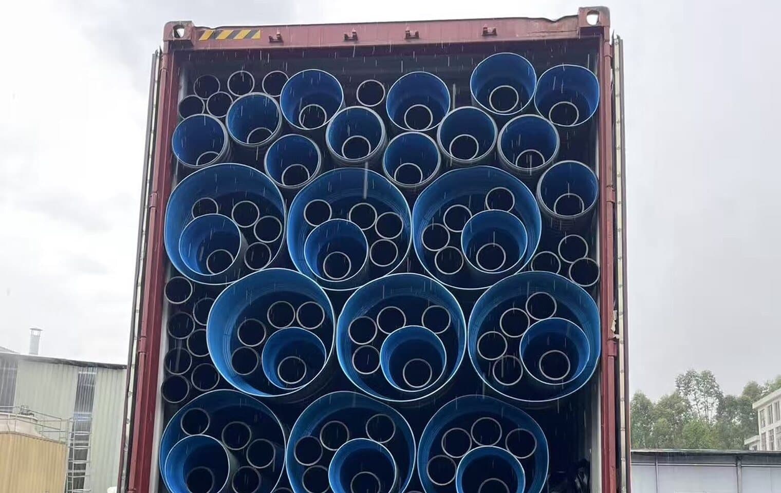 A container packed to the door with pipe and fittings for export