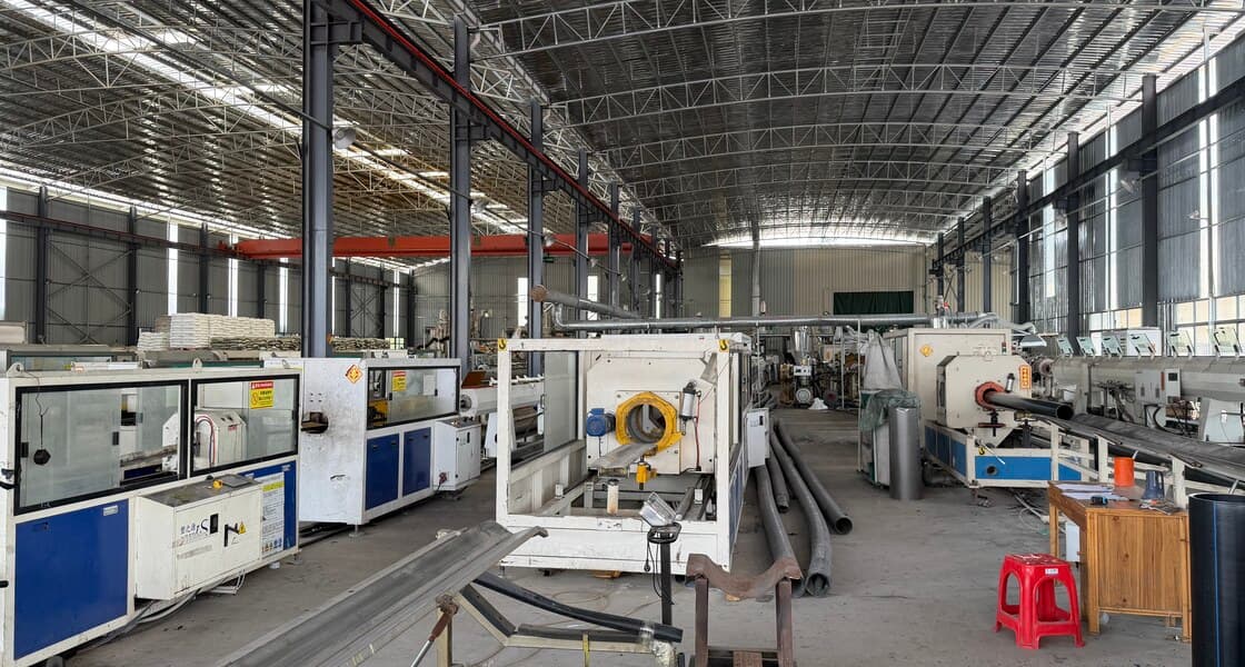 A wide view of the extrusion hall with lines running down both sides