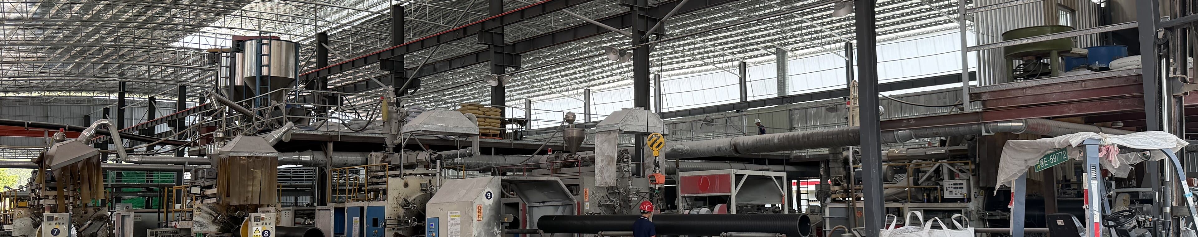 The length of the production hall, extrusion lines running down both sides
