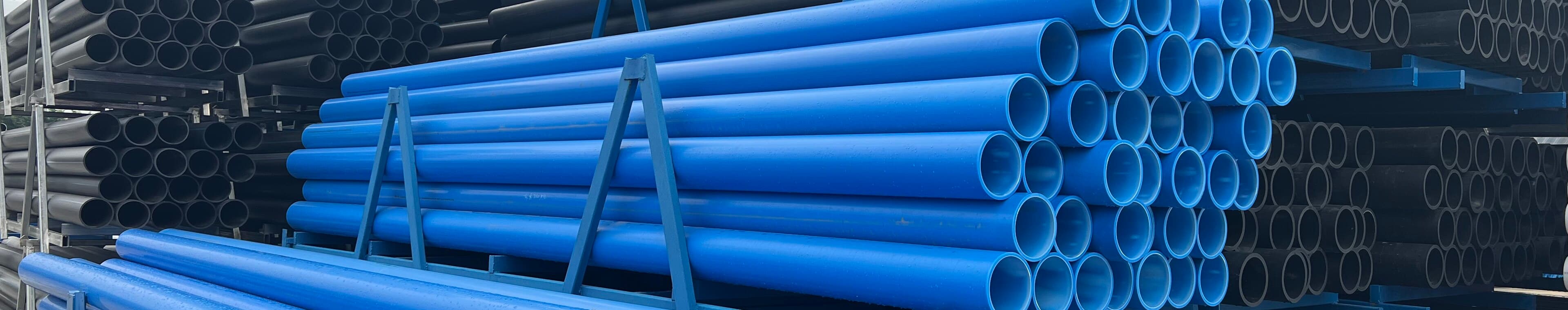Heavy-wall PE pipe in the yard, the sizes heat networks are built from