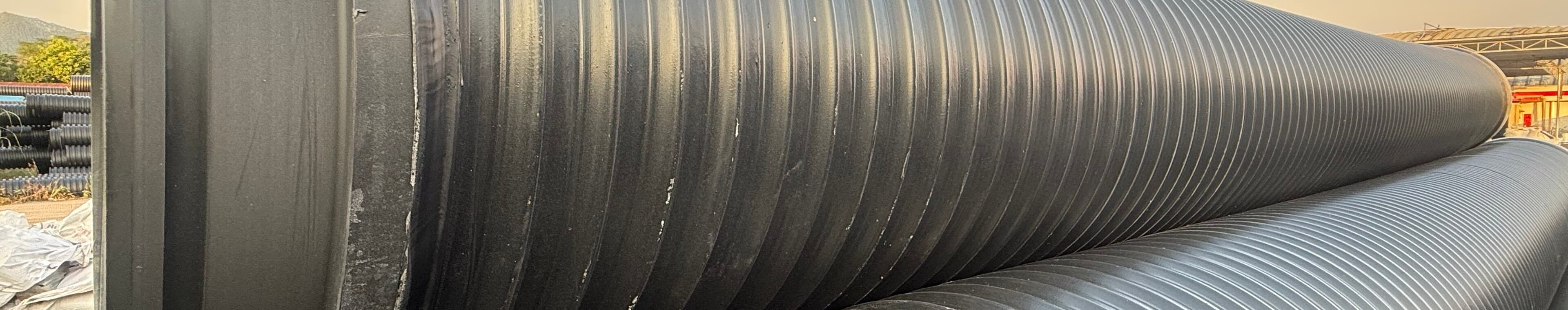 Small-diameter PE pipe racked together, the sizes a course irrigation network uses