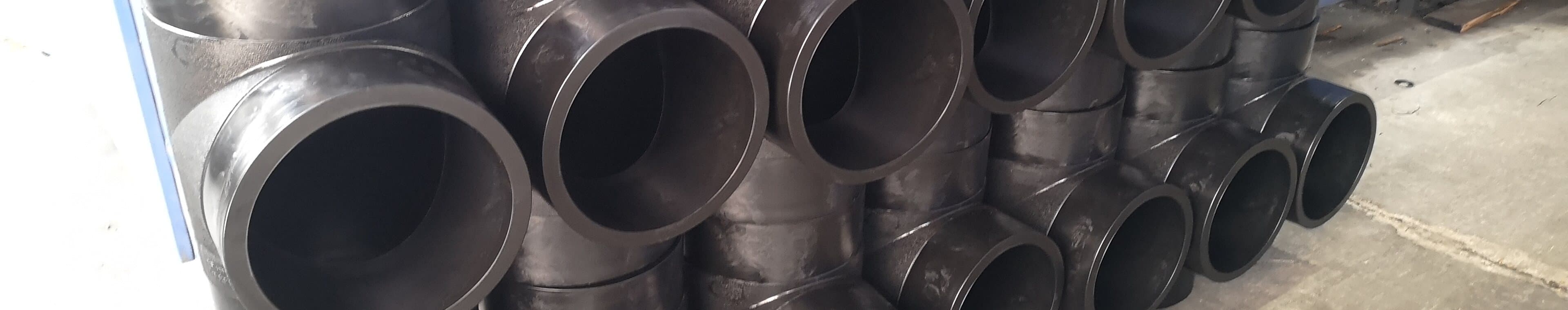 Fabricated PE tees and large-bore branches lined up after welding